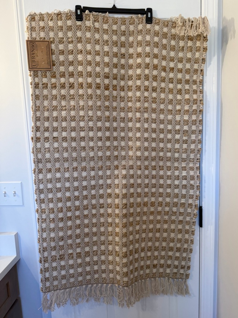 Urban Outfitters Woven with Natural Fivers Check Accent Rug  in Beige and Cream